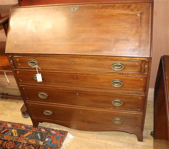 A George III inlaid mahogany bureau W.104cm
